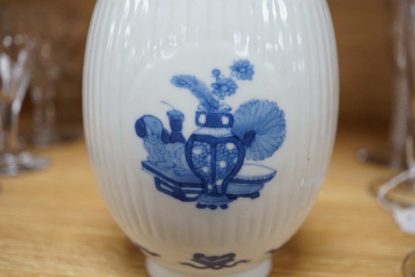 A Chinese blue and white fluted ovoid jar 16cm